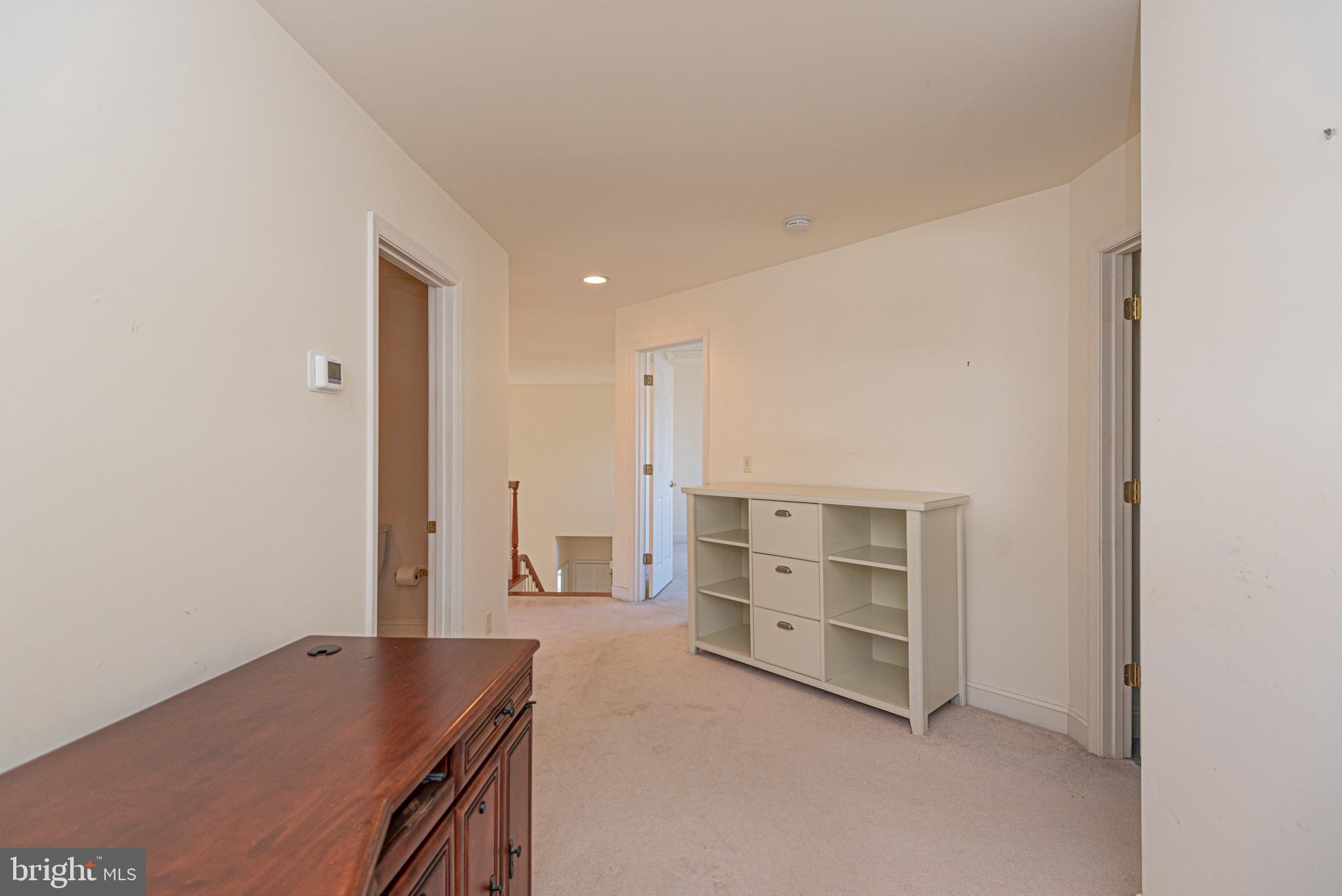 6023 Tarry Town Road Salisbury, MD 21801 - Photo 37 of 61 Spacious hallway with inviting light.