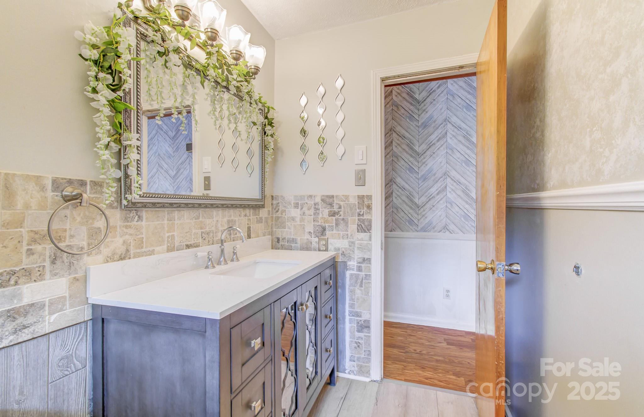 617 Oak Grove Road Kings Mountain, NC 28086 - Photo 16 of 32 a bathroom with a sink and a mirror