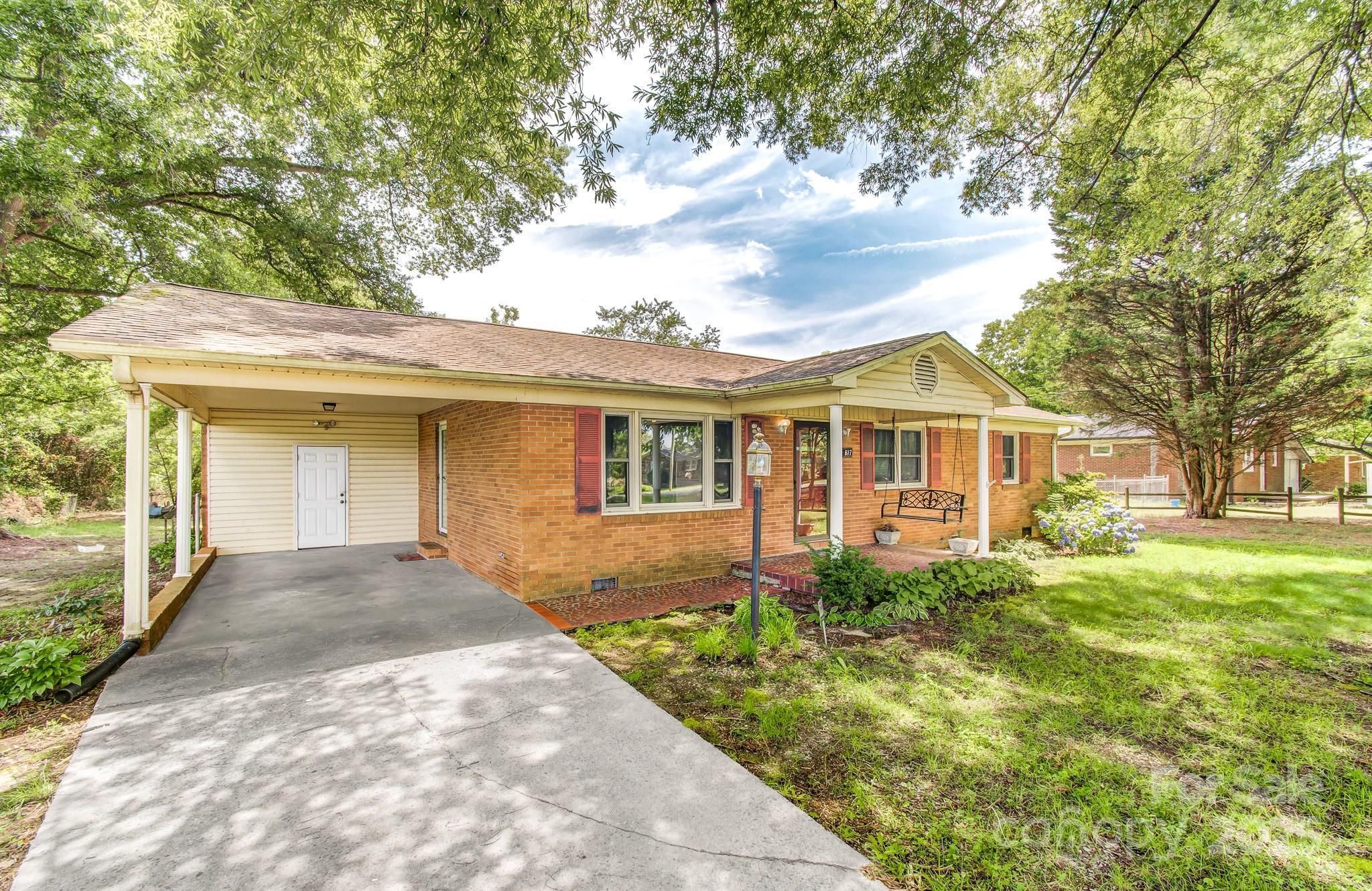 617 Oak Grove Road Kings Mountain, NC 28086 - Photo 25 of 32 a front view of a house with garden