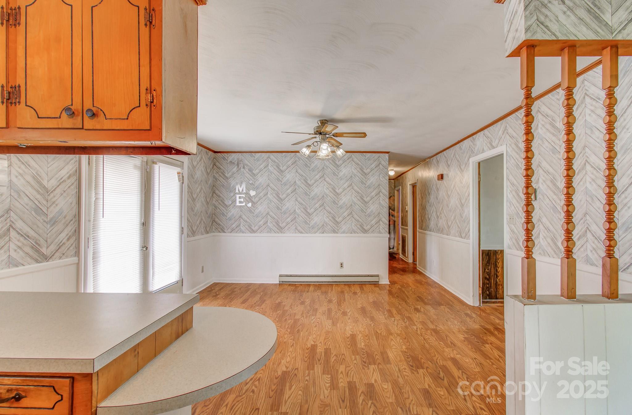617 Oak Grove Road Kings Mountain, NC 28086 - Photo 8 of 32 a view of a room with wooden floor and cabinet