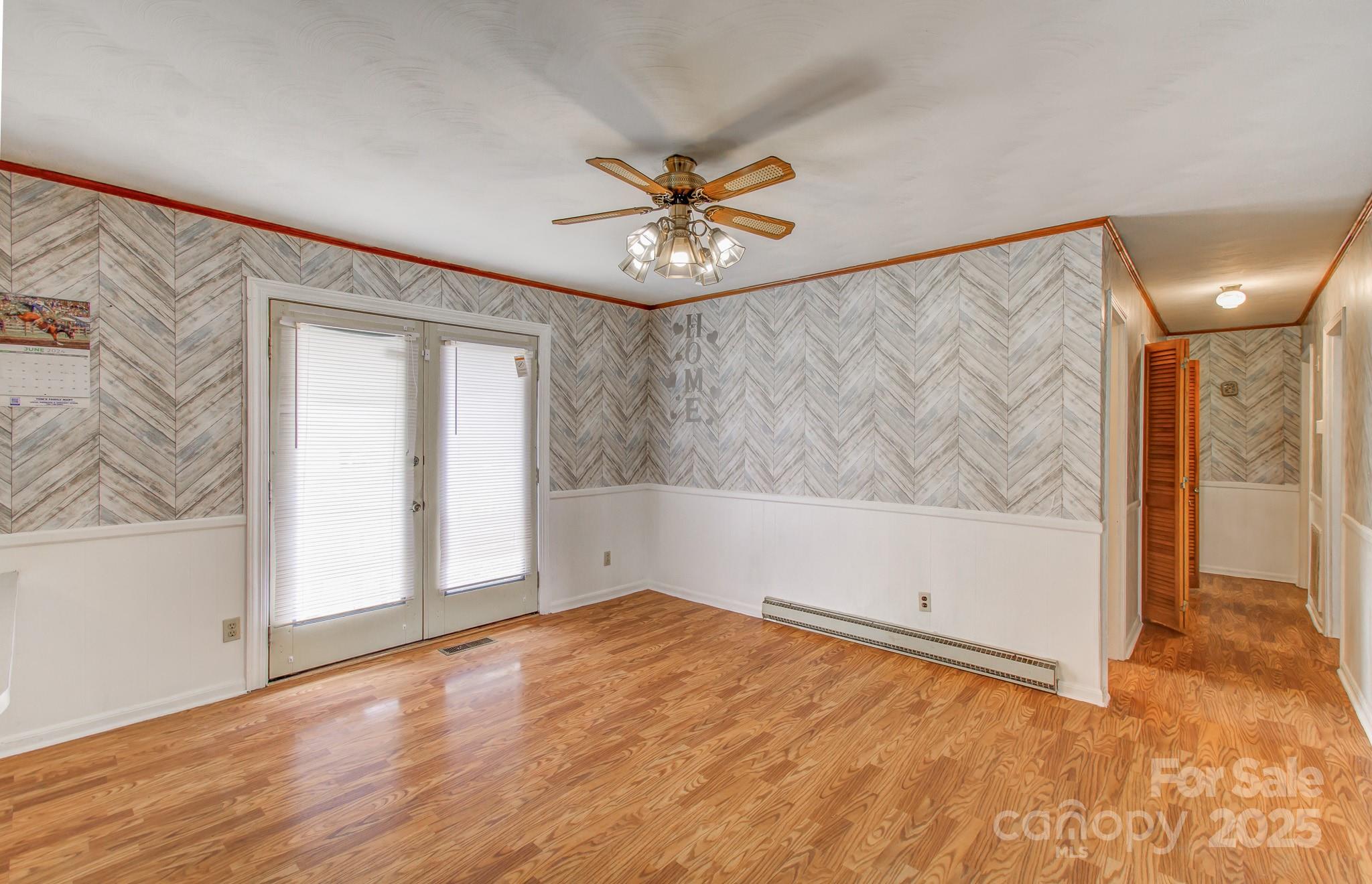 617 Oak Grove Road Kings Mountain, NC 28086 - Photo 10 of 32 wooden floor in an empty room with a window