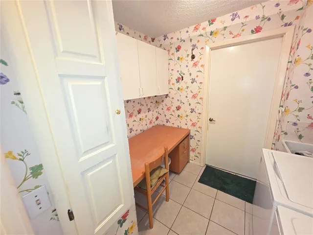 a bathroom with a sink and a shower curtain