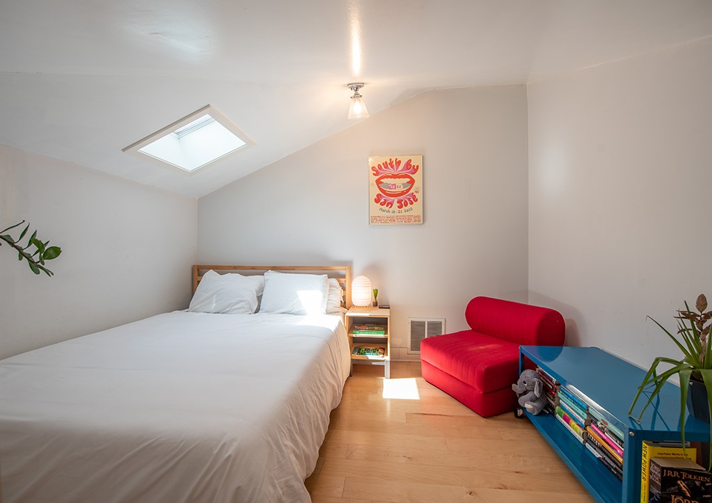 3609 Clawson Road, Unit A Austin, TX 78704 - Photo 11 of 17 A skylight brightens this restful sleeping area with wood floors.