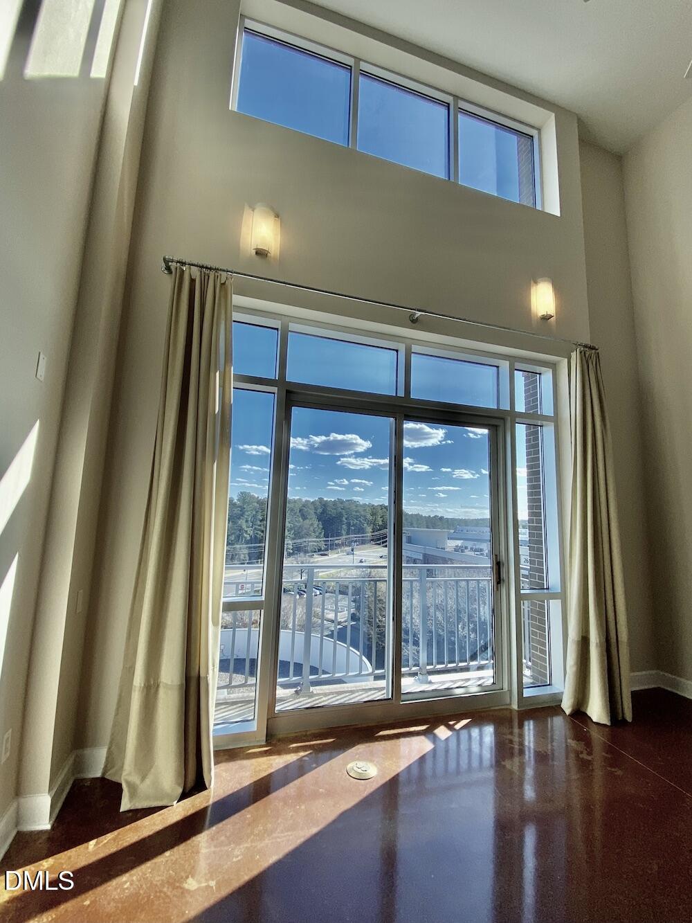 2608 Erwin Road, Unit 428 Durham, NC 27705 - Photo 13 of 33 a view of a room with wooden floor and a window
