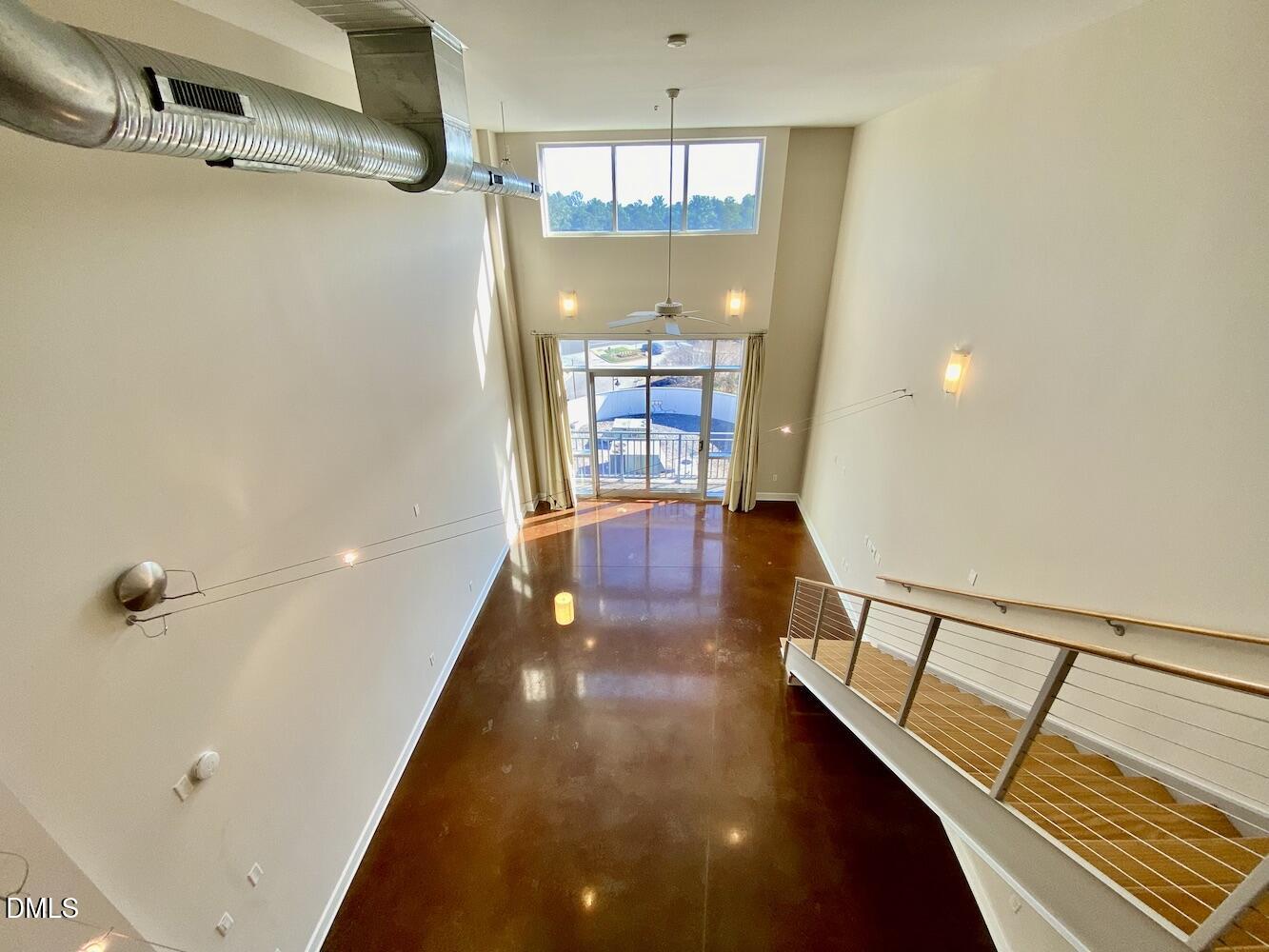 2608 Erwin Road, Unit 428 Durham, NC 27705 - Photo 14 of 33 a view of a hallway with wooden floor and staircase