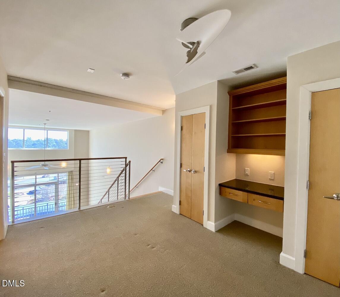 2608 Erwin Road, Unit 428 Durham, NC 27705 - Photo 18 of 33 a view of an empty room with a window
