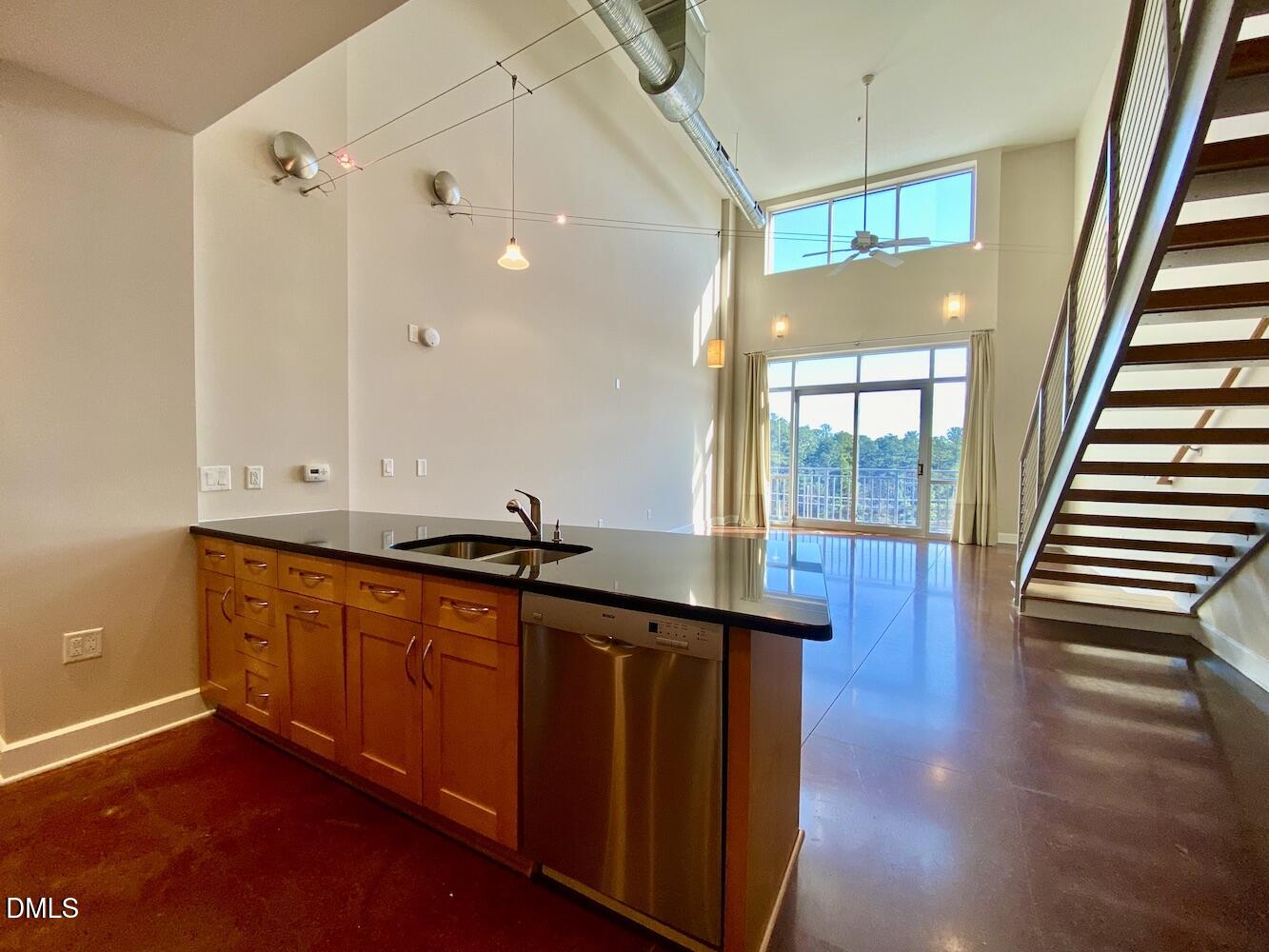 2608 Erwin Road, Unit 428 Durham, NC 27705 - Photo 4 of 33 a bathroom with sinks and a wooden floor