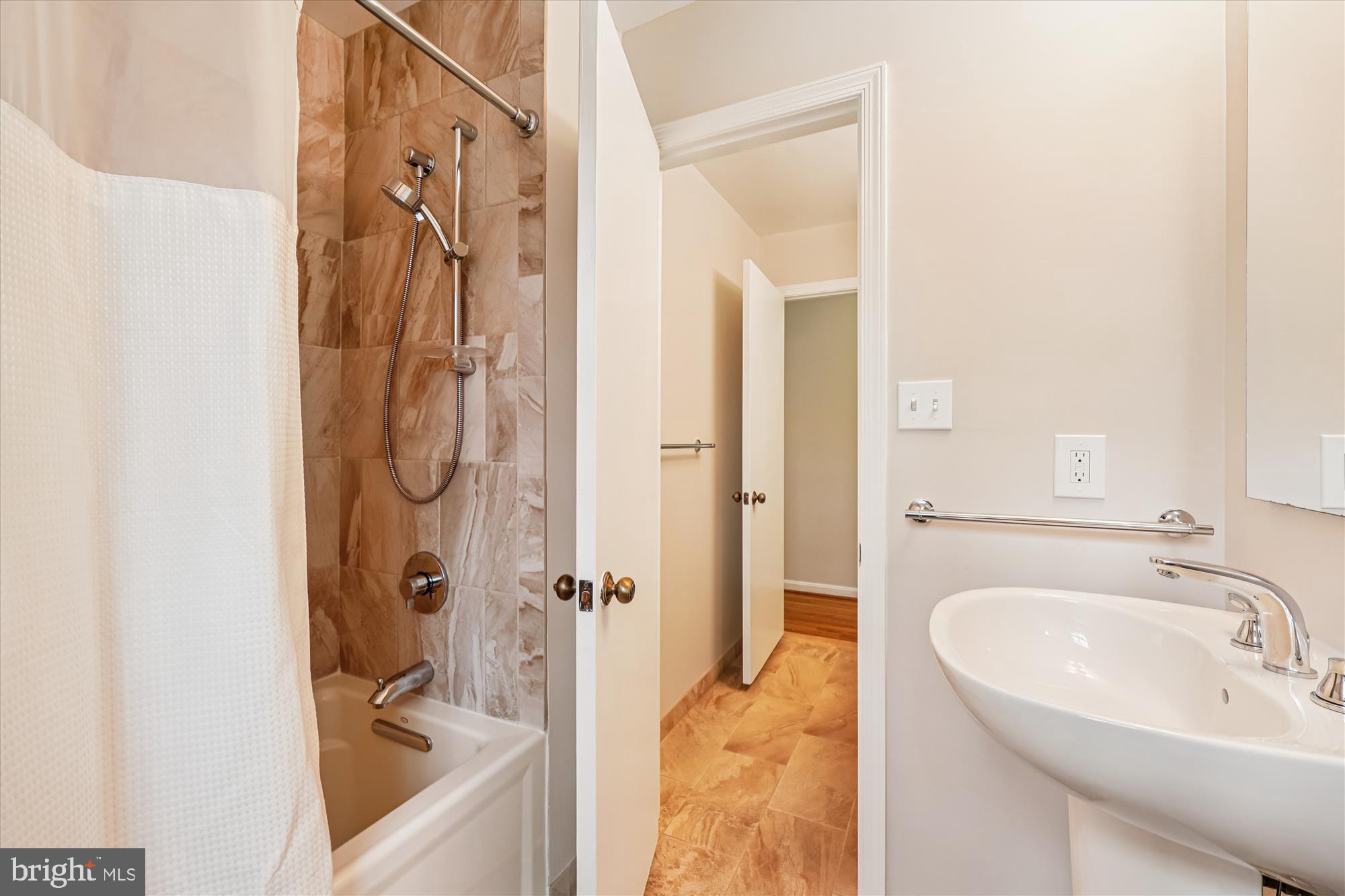 8212 Killean Way Potomac, MD 20854 - Photo 33 of 51 a bathroom with a sink and a shower