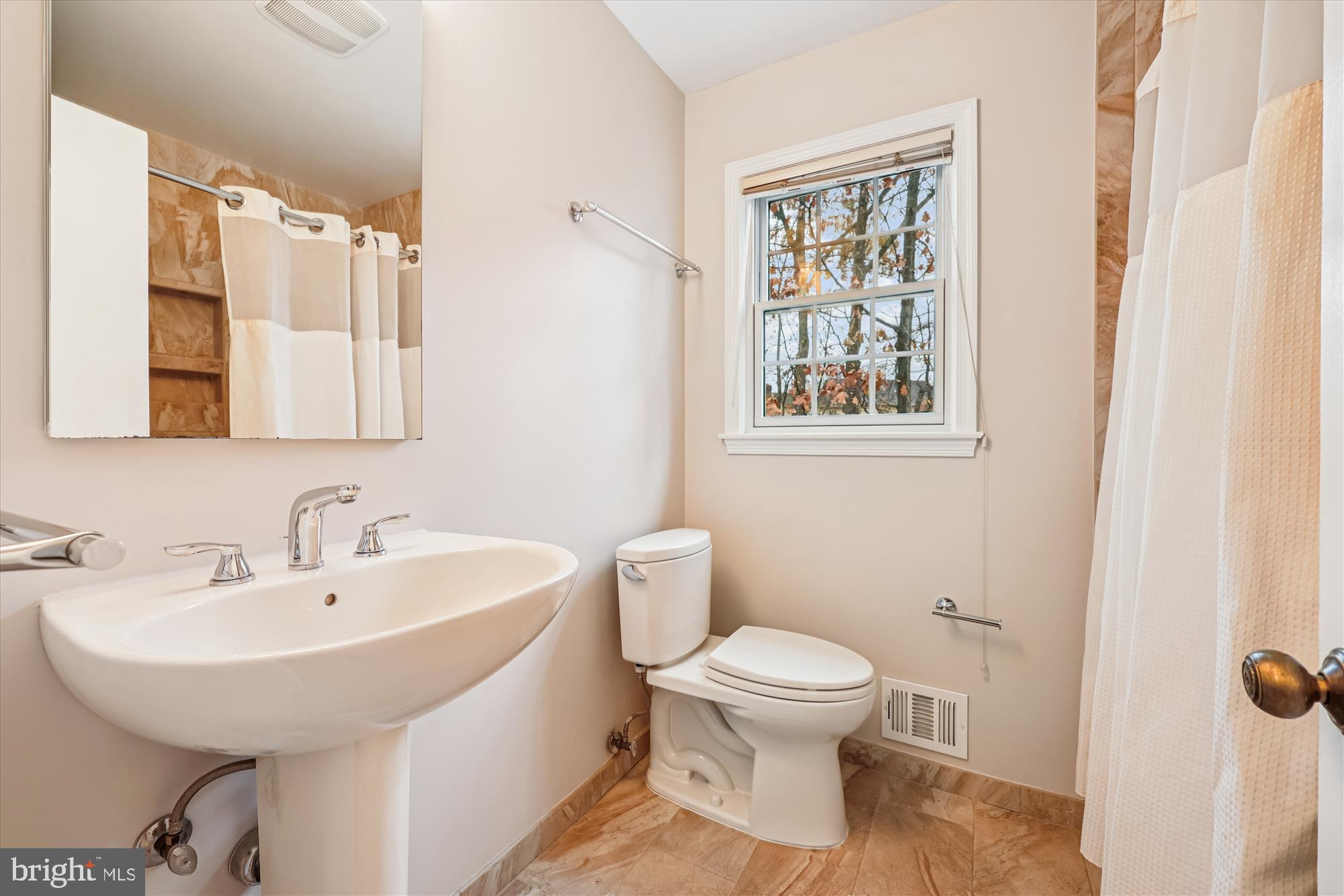 8212 Killean Way Potomac, MD 20854 - Photo 34 of 51 a bathroom with a sink and a toilet