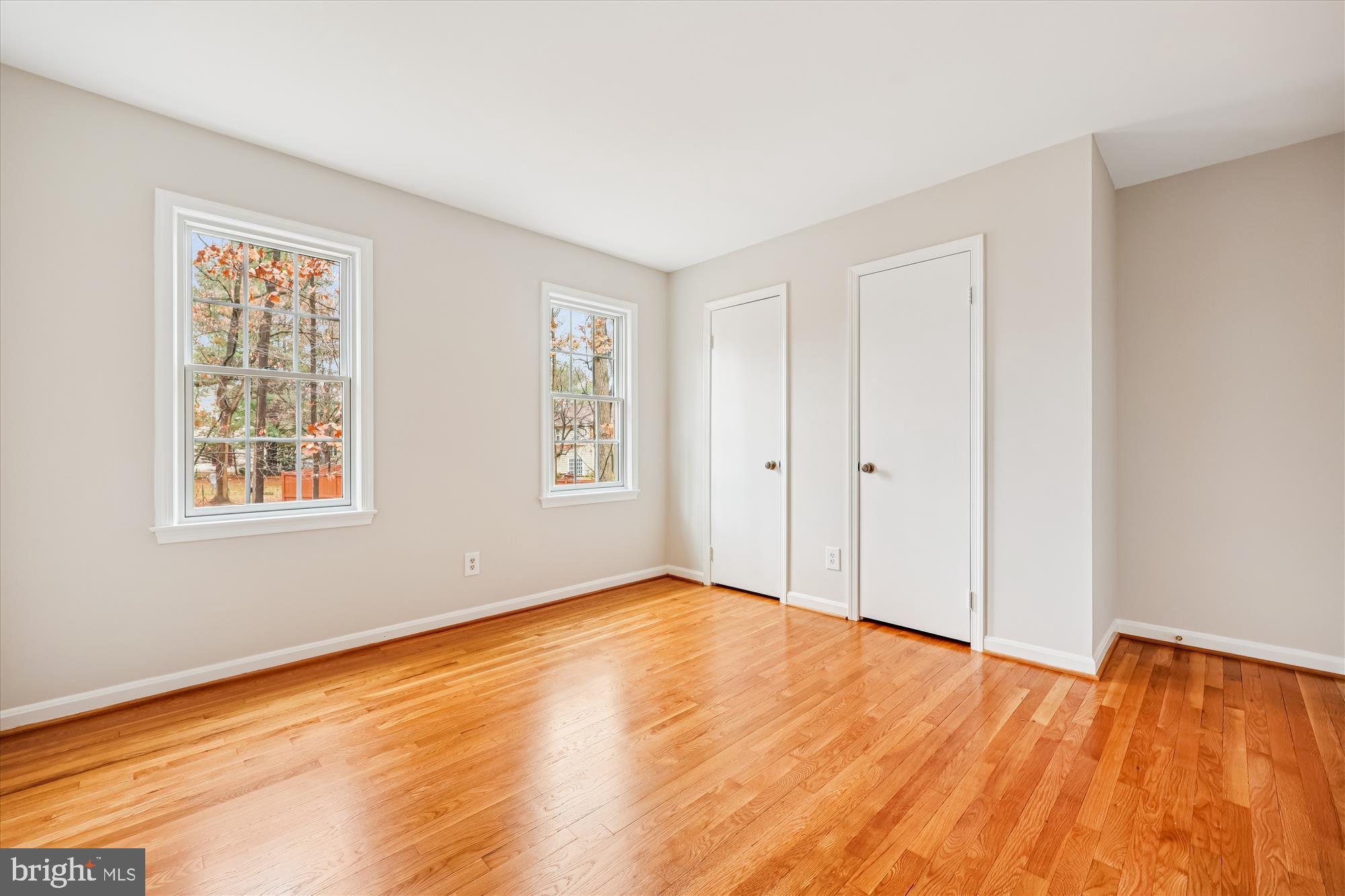 8212 Killean Way Potomac, MD 20854 - Photo 35 of 51 a view of empty room with wooden floor and fan