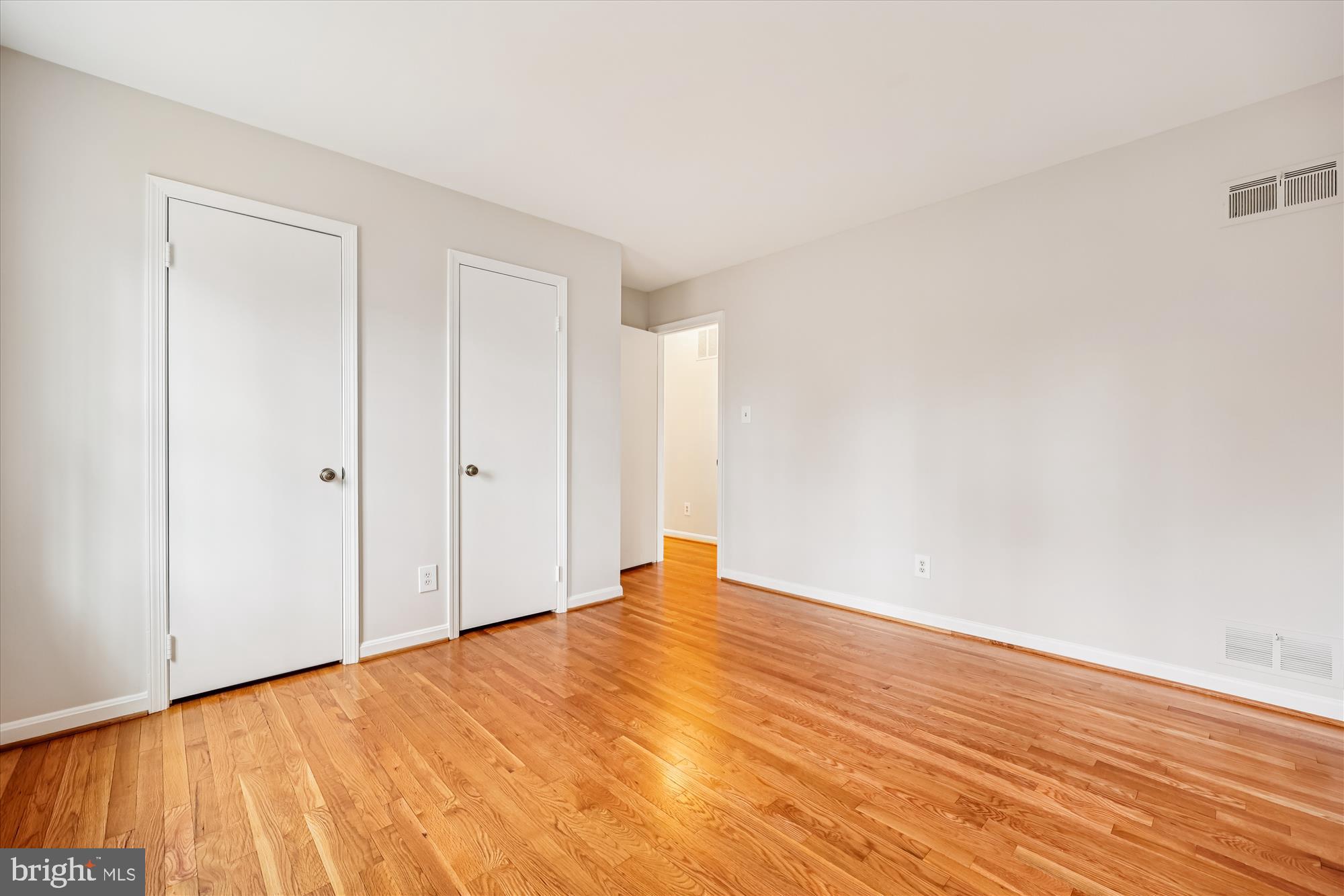8212 Killean Way Potomac, MD 20854 - Photo 36 of 51 a view of empty room with wooden floor