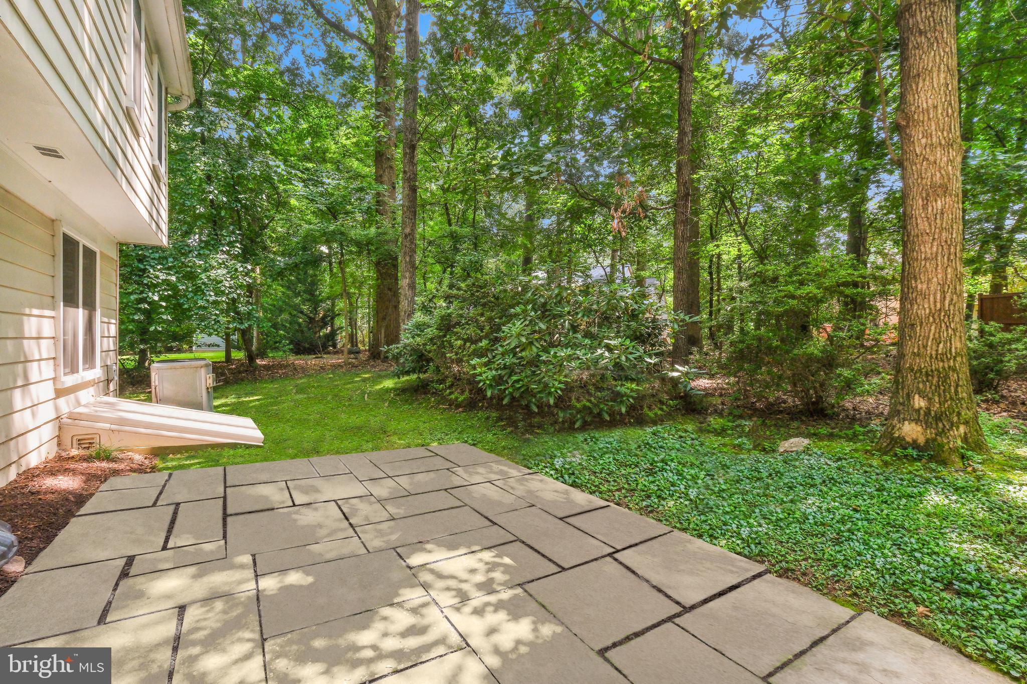 8212 Killean Way Potomac, MD 20854 - Photo 49 of 51 a view of backyard with seating space