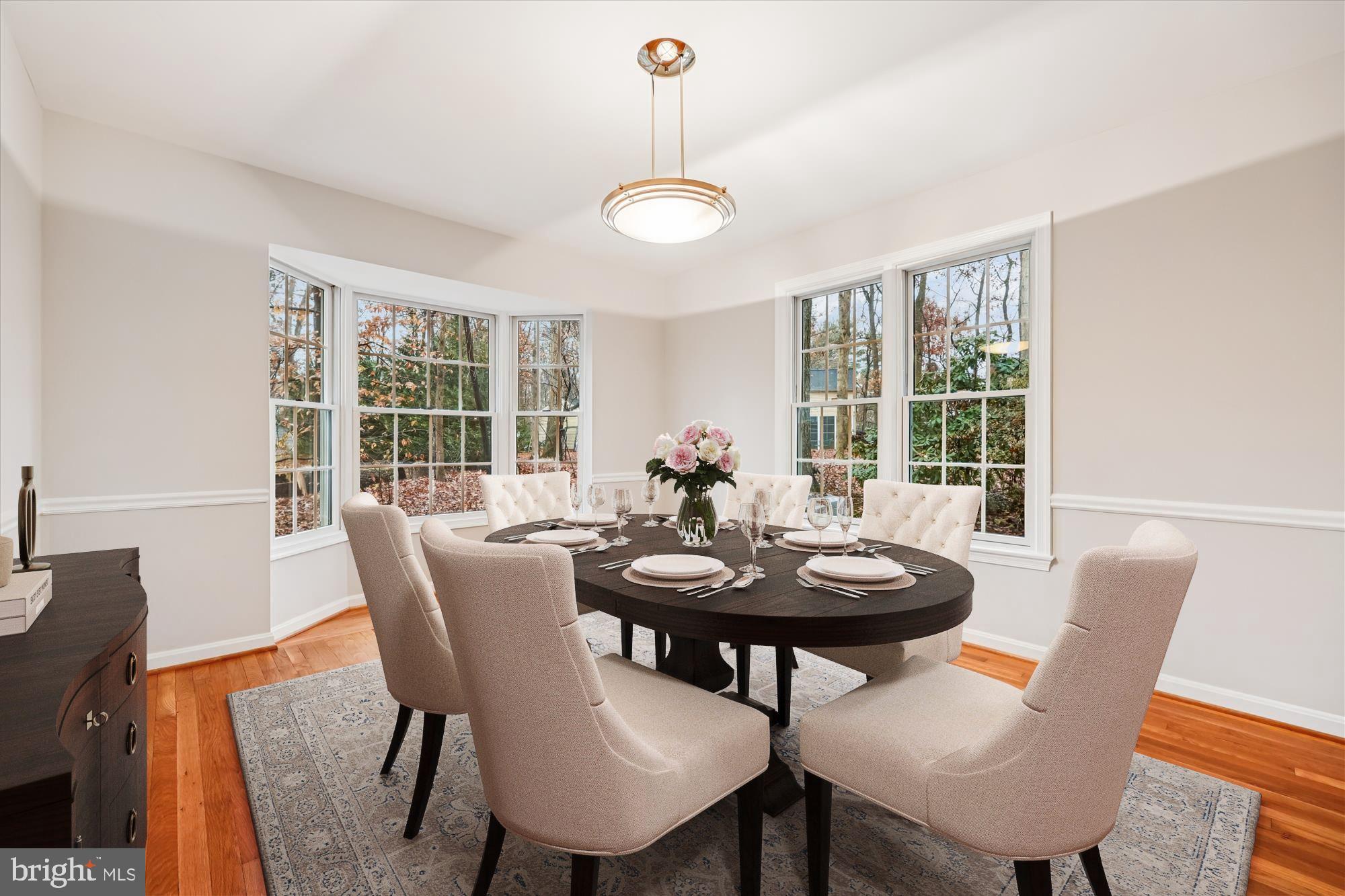 8212 Killean Way Potomac, MD 20854 - Photo 7 of 51 a view of a dining room with furniture window and outside view