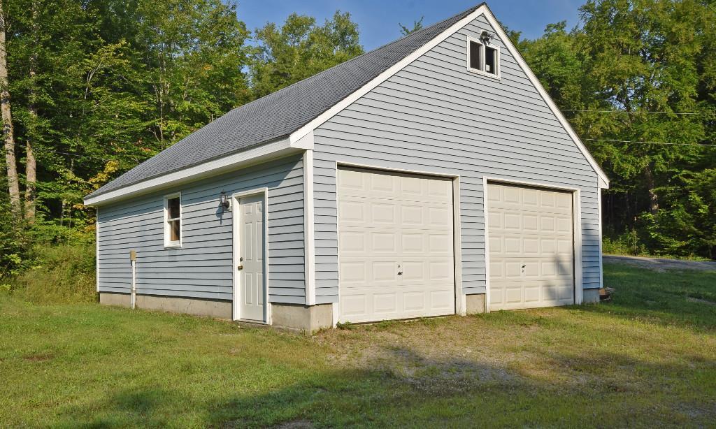 480 Bunker Hill Road Lagrange, ME 04453 - Photo 16 of 23 Over-sized two-car garage with...