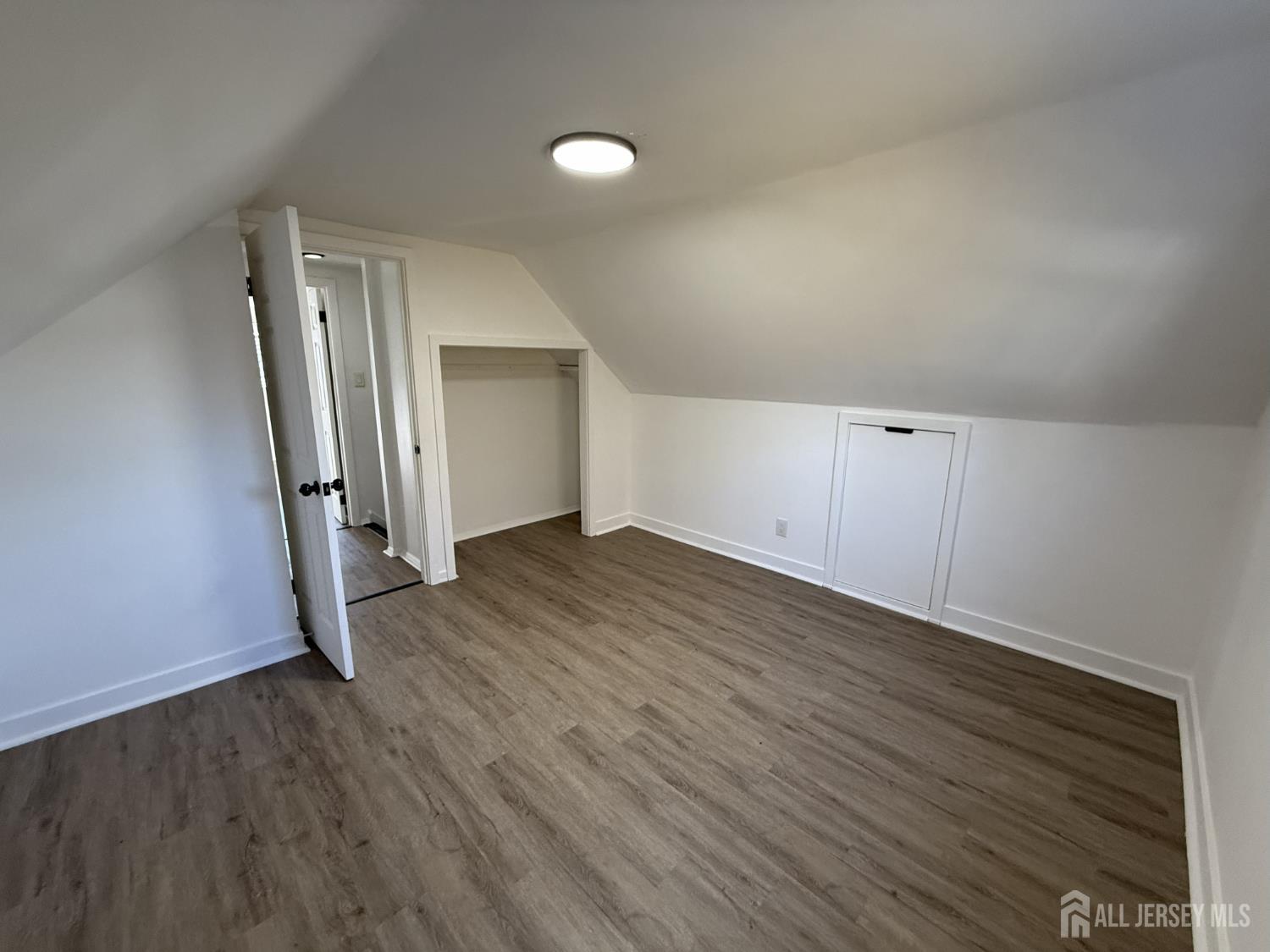 1060 Terrace Boulevard Ewing, NJ 08618 - Photo 13 of 15 wooden floor in an empty room with a window