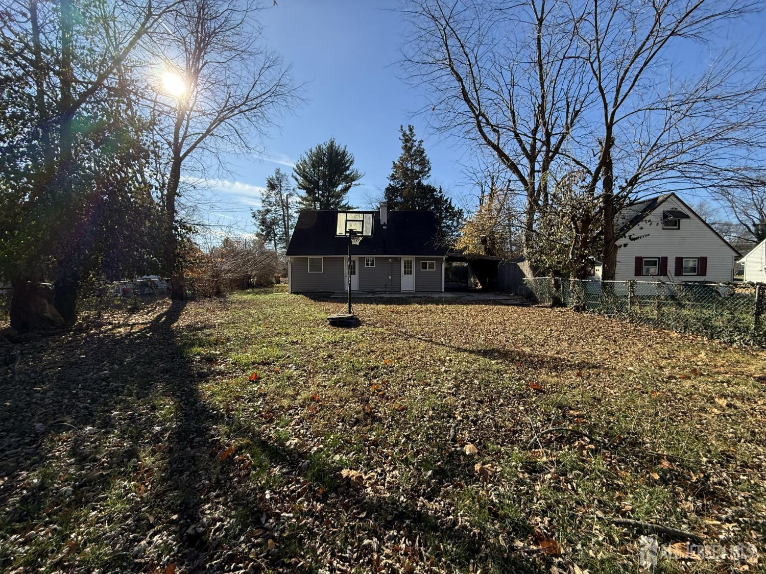 1060 Terrace Boulevard Ewing, NJ 08618 - Photo 15 of 15 a view of large yard with a fountain and large trees