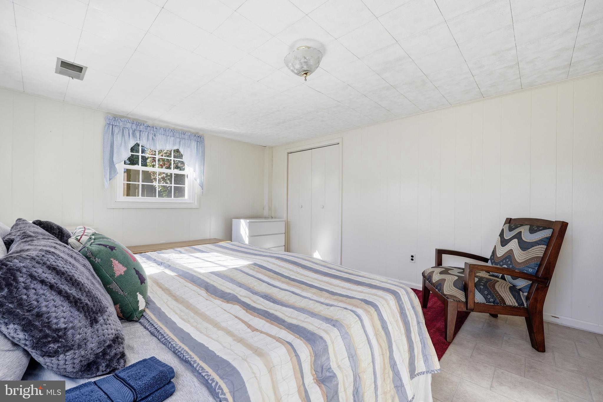 12709 Castleleigh Court Silver Spring, MD 20904 - Photo 27 of 38 a bedroom with a bed and a window
