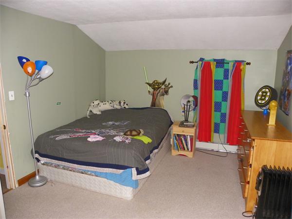77 Mason Road Townsend, MA 01474 - Photo 8 of 11 a bed room with a bed and a couch