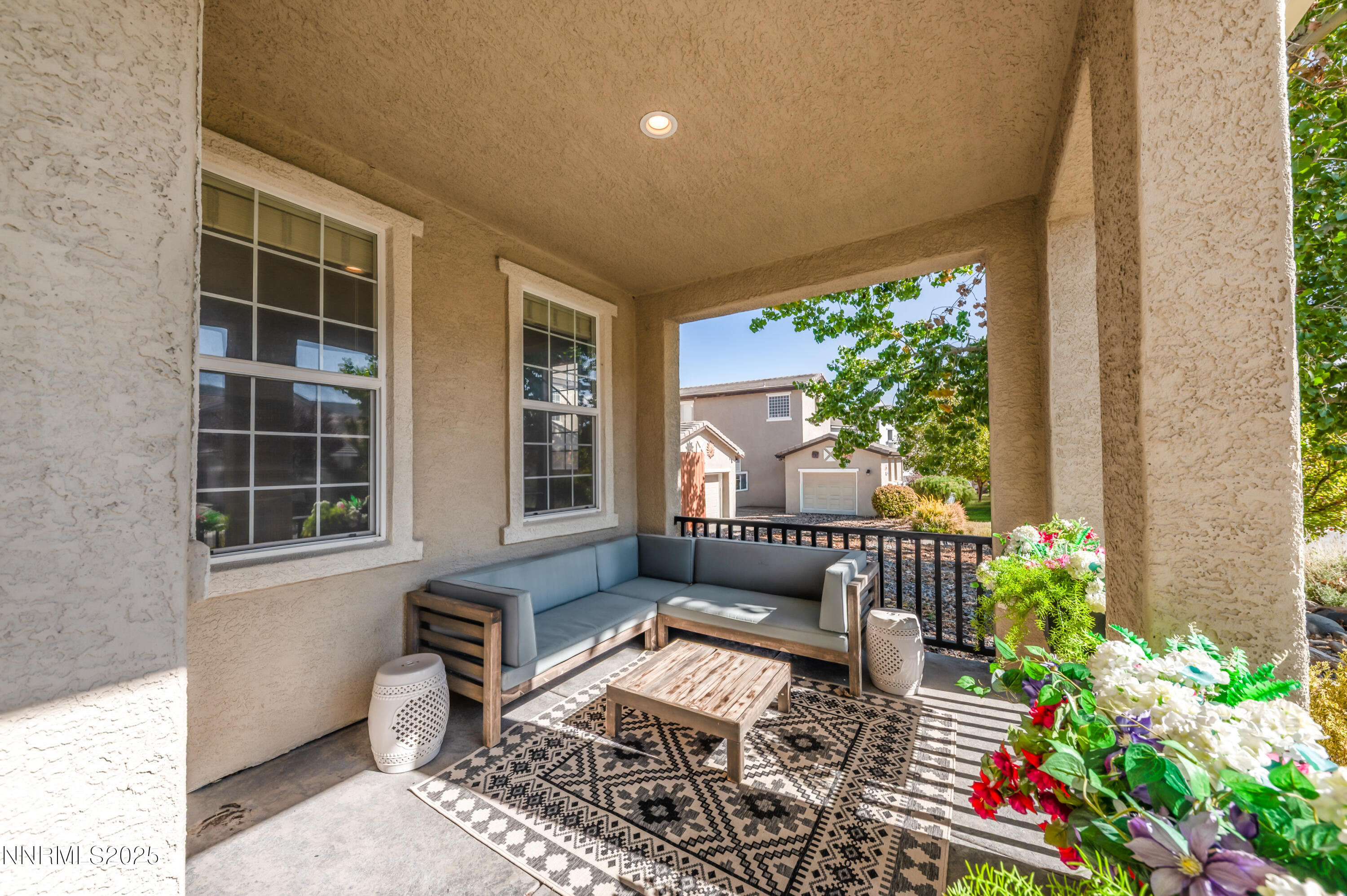 1770 Kodiak Circle Reno, NV 89511 - Photo 2 of 29 a balcony with furniture and a potted plant