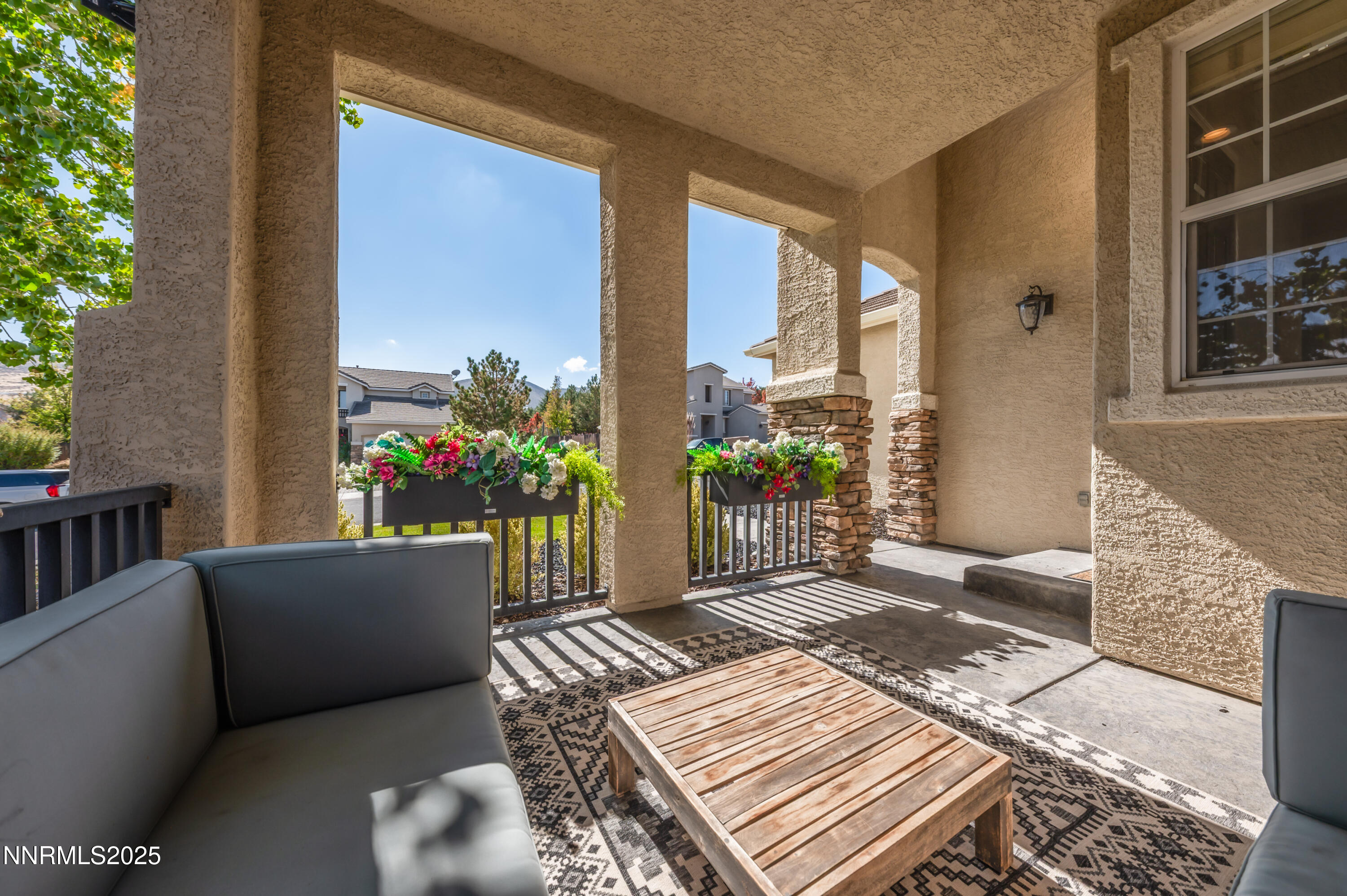 1770 Kodiak Circle Reno, NV 89511 - Photo 3 of 29 a balcony with furniture and flowers