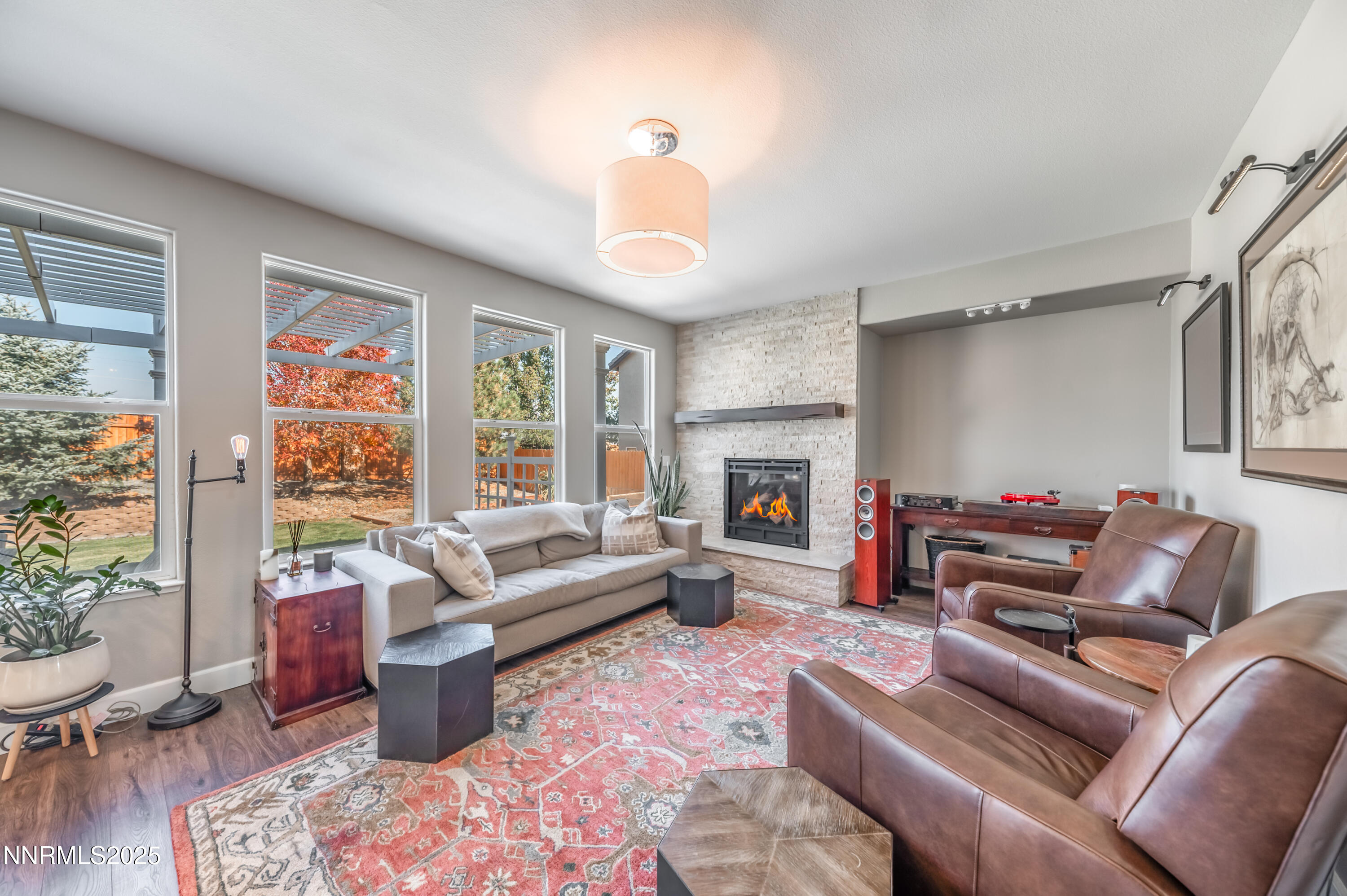 1770 Kodiak Circle Reno, NV 89511 - Photo 6 of 29 a living room with furniture or couch and a fireplace