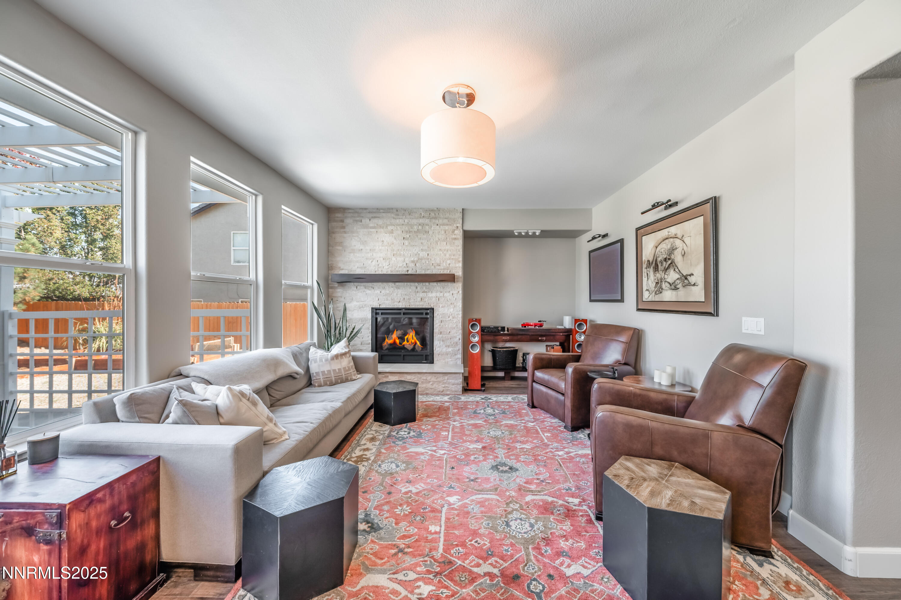 1770 Kodiak Circle Reno, NV 89511 - Photo 7 of 29 a living room with furniture fireplace and a large window