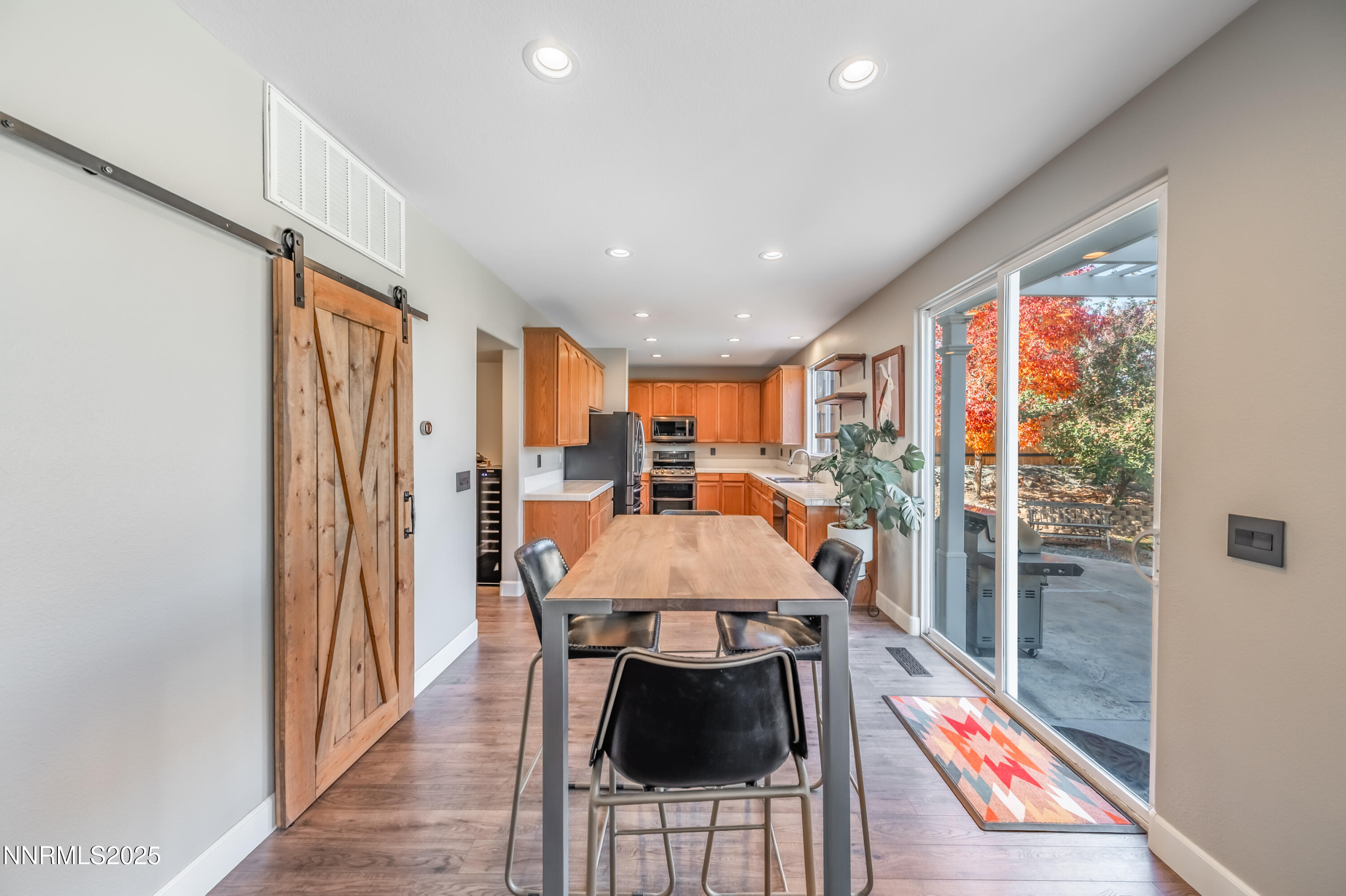 1770 Kodiak Circle Reno, NV 89511 - Photo 9 of 29 a room with furniture and wooden floor