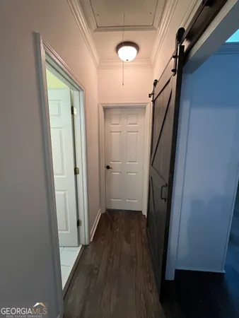 a view of a livingroom with a hardwood floor