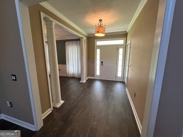 a kitchen with stainless steel appliances granite countertop a refrigerator and a stove