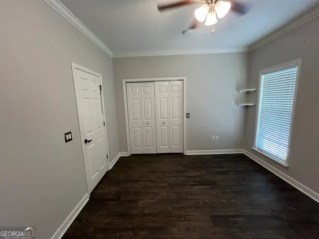 a view of small space with racks on the wall