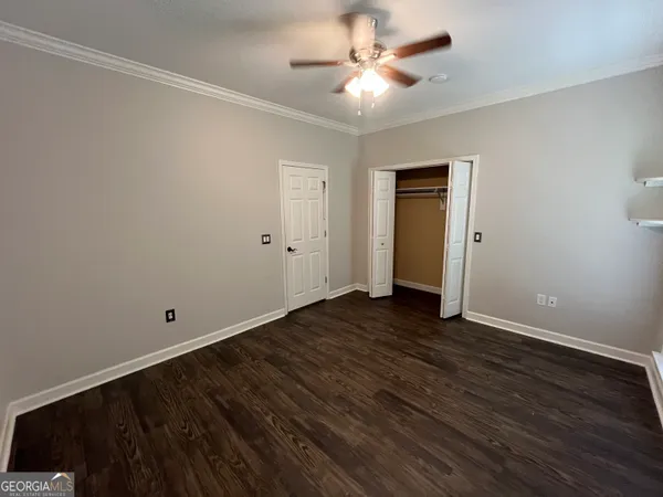 a bathroom with a tub and a window