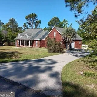 a view of a porch with wooden floor and outdoor space