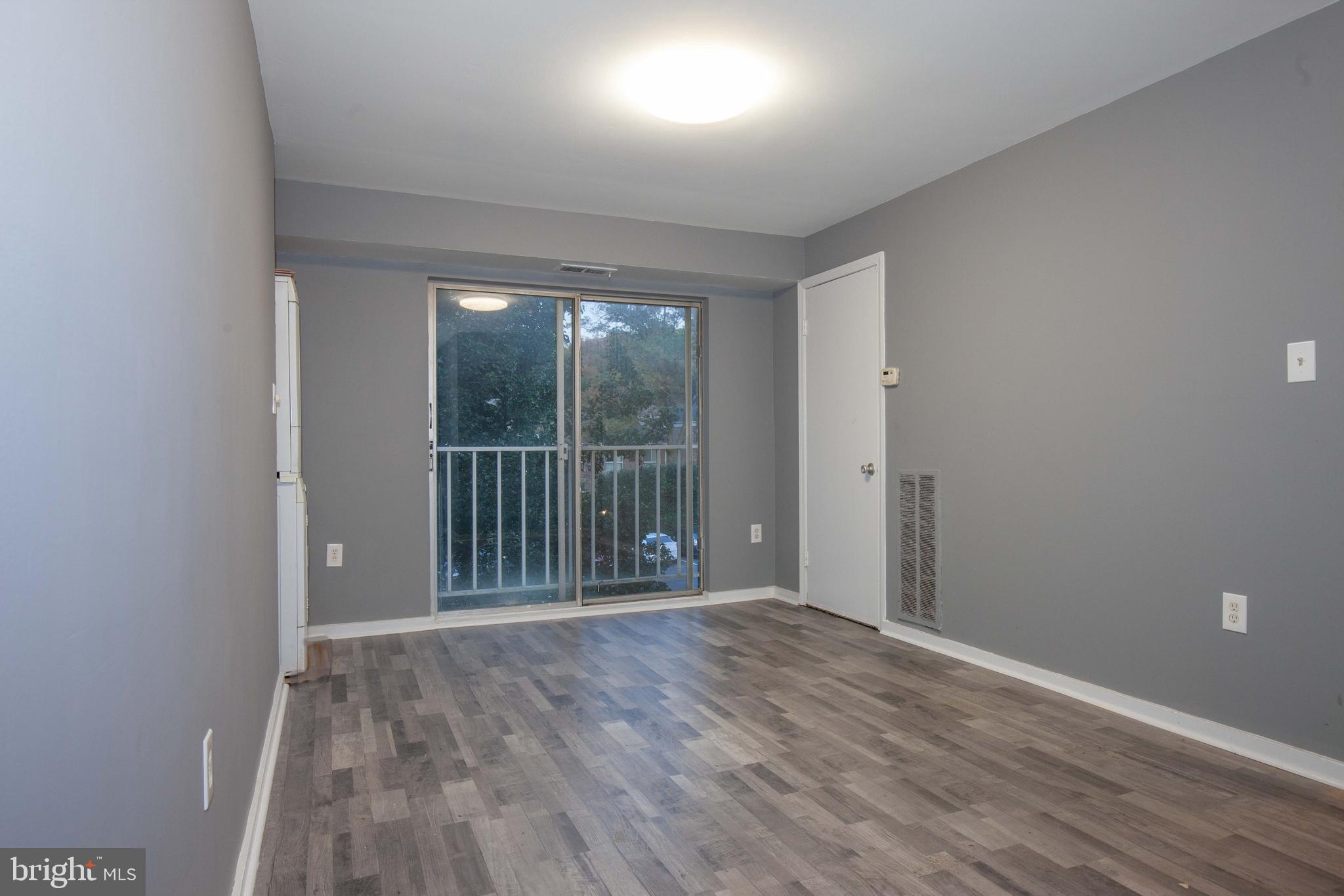 3232 Hewitt Avenue, Unit 24A Silver Spring, MD 20906 - Photo 8 of 23 Separate dining area with newly installed floors!