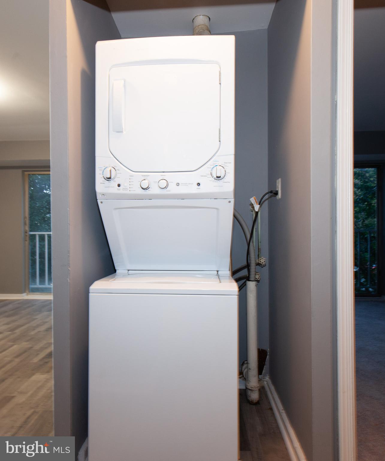 3232 Hewitt Avenue, Unit 24A Silver Spring, MD 20906 - Photo 10 of 23 Stacked washer/dryer in unit