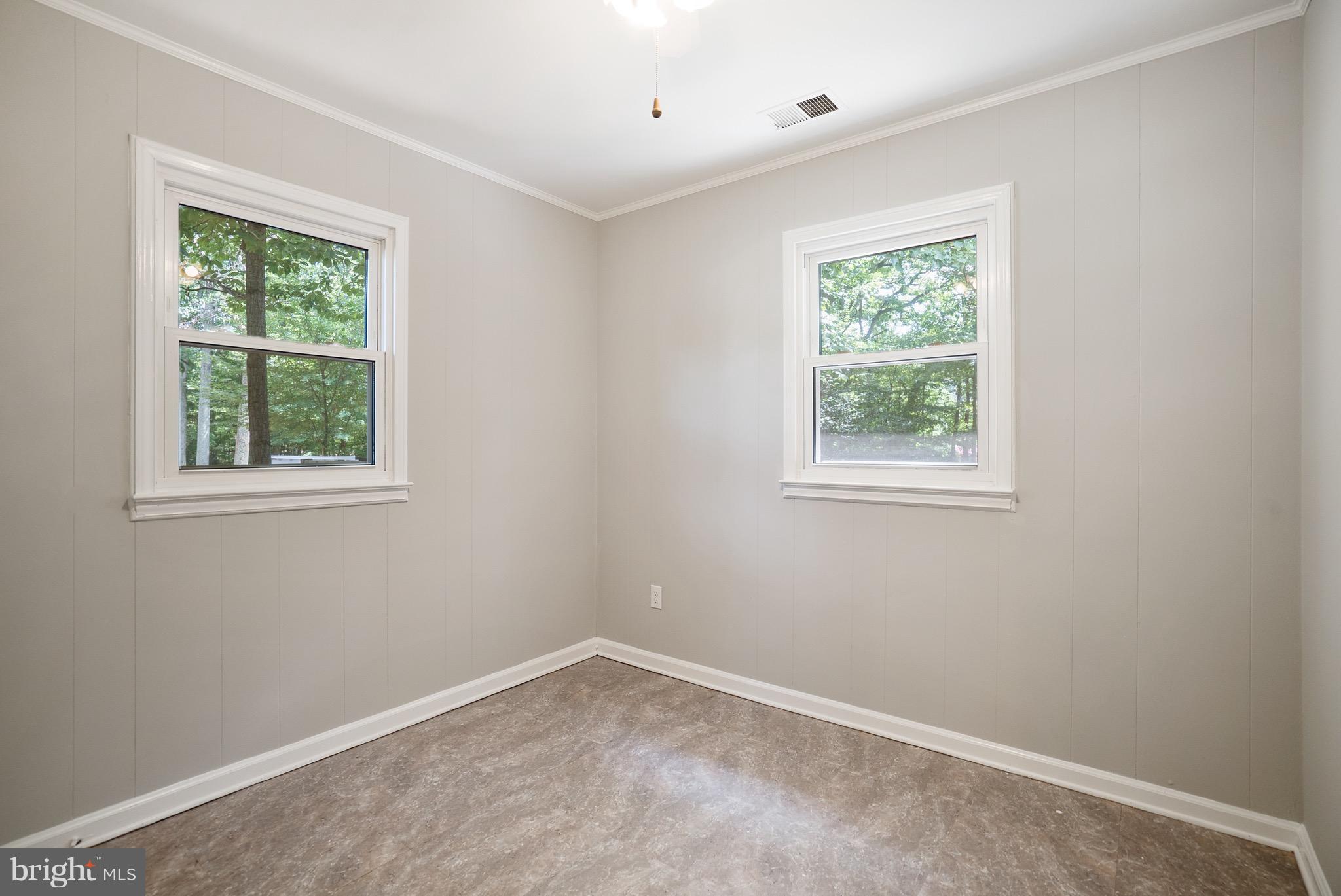 6928 Sydenstricker Road Springfield, VA 22153 - Photo 22 of 30 an empty room with a window