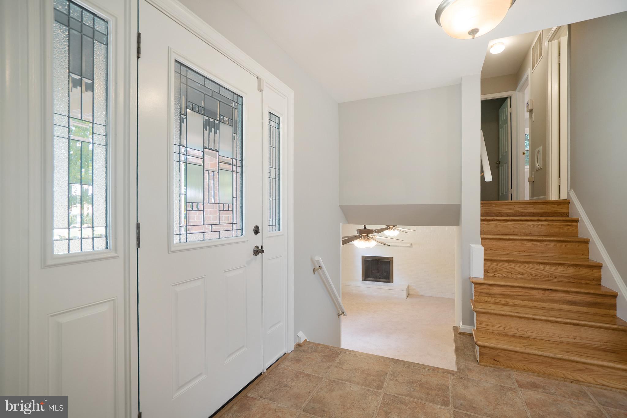 6928 Sydenstricker Road Springfield, VA 22153 - Photo 4 of 30 a bathroom with a sink and mirror