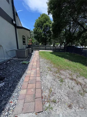 a view of backyard with green space