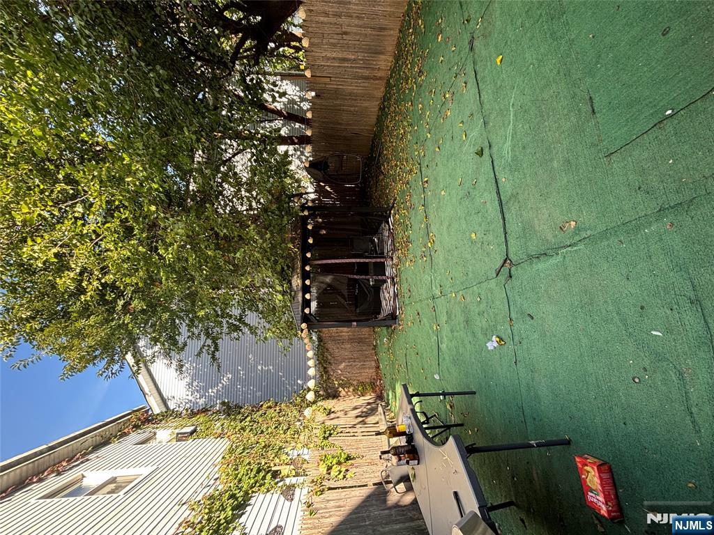 23 Oak Street Paterson, NJ 07501 - Photo 18 of 19 a view of a backyard