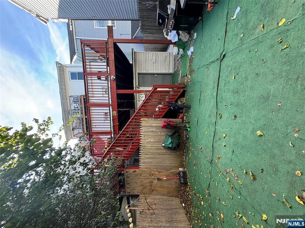23 Oak Street Paterson, NJ 07501 - Photo 19 of 19 a view of a porch with a patio