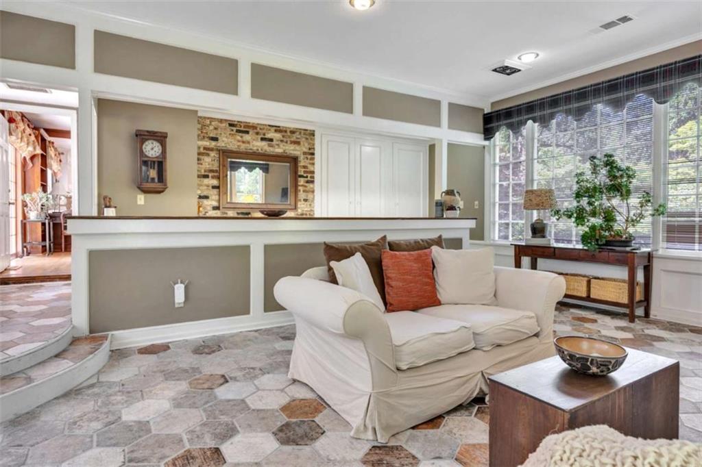 103 Gabriel Way Social Circle, GA 30025 - Photo 28 of 70 a living room with furniture and a large window