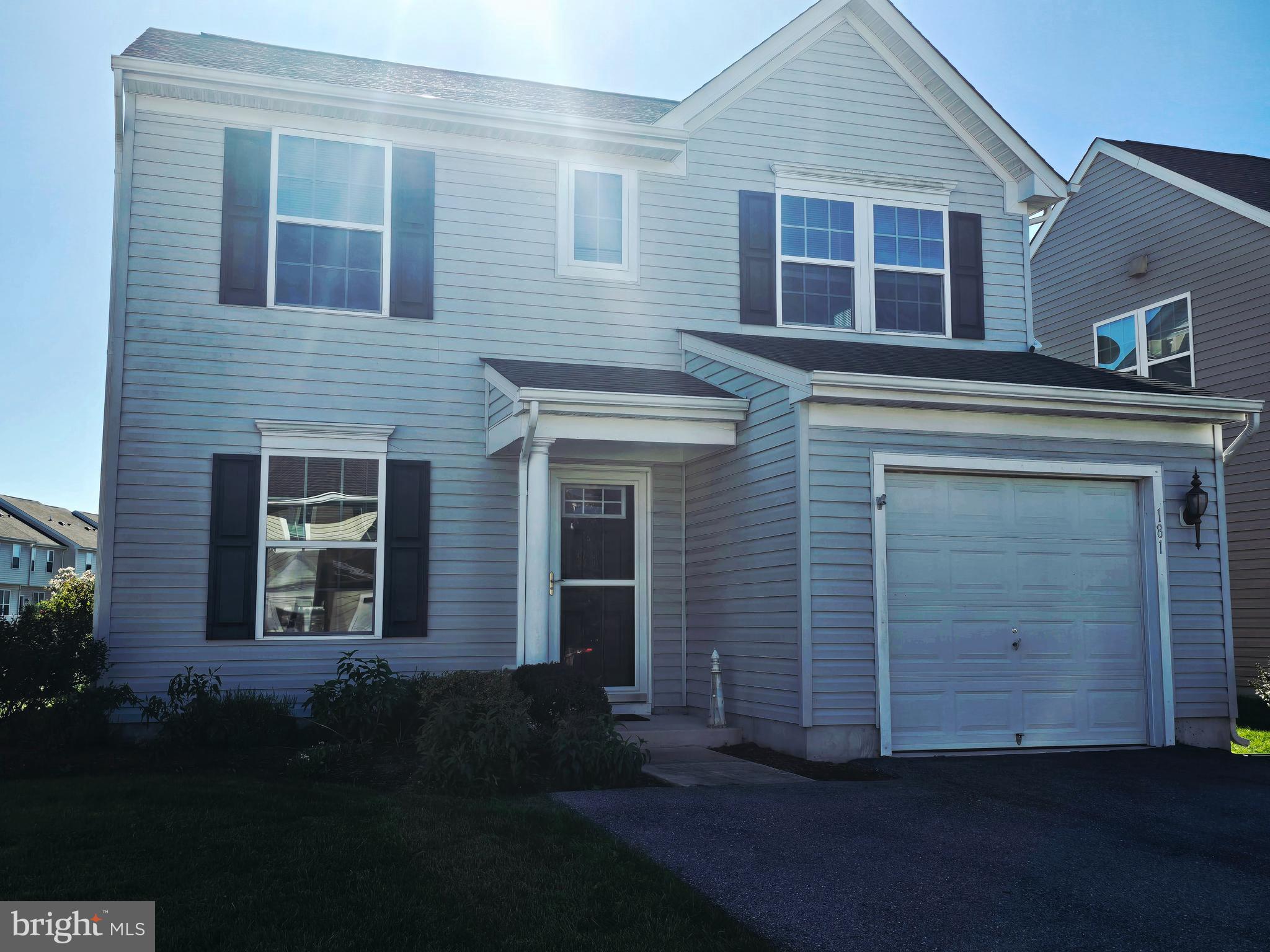 181 Bobbys Branch Road, Unit 35 Millsboro, DE 19966 - Photo 2 of 26 a front view of a house