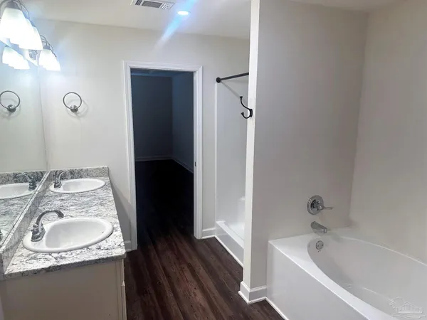 a view of an empty walk in closet