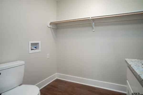 a bathroom with a toilet