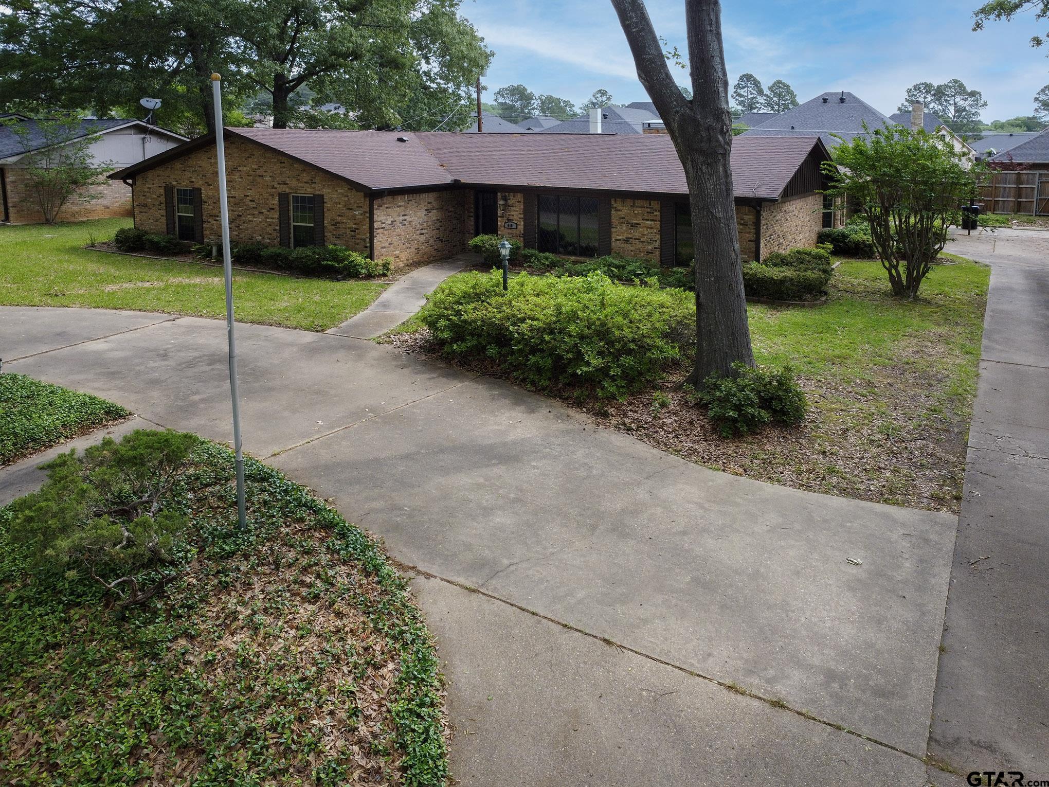 610 Rockwall Drive Longview, TX 75604 - Photo 35 of 39 a view of a house with a street