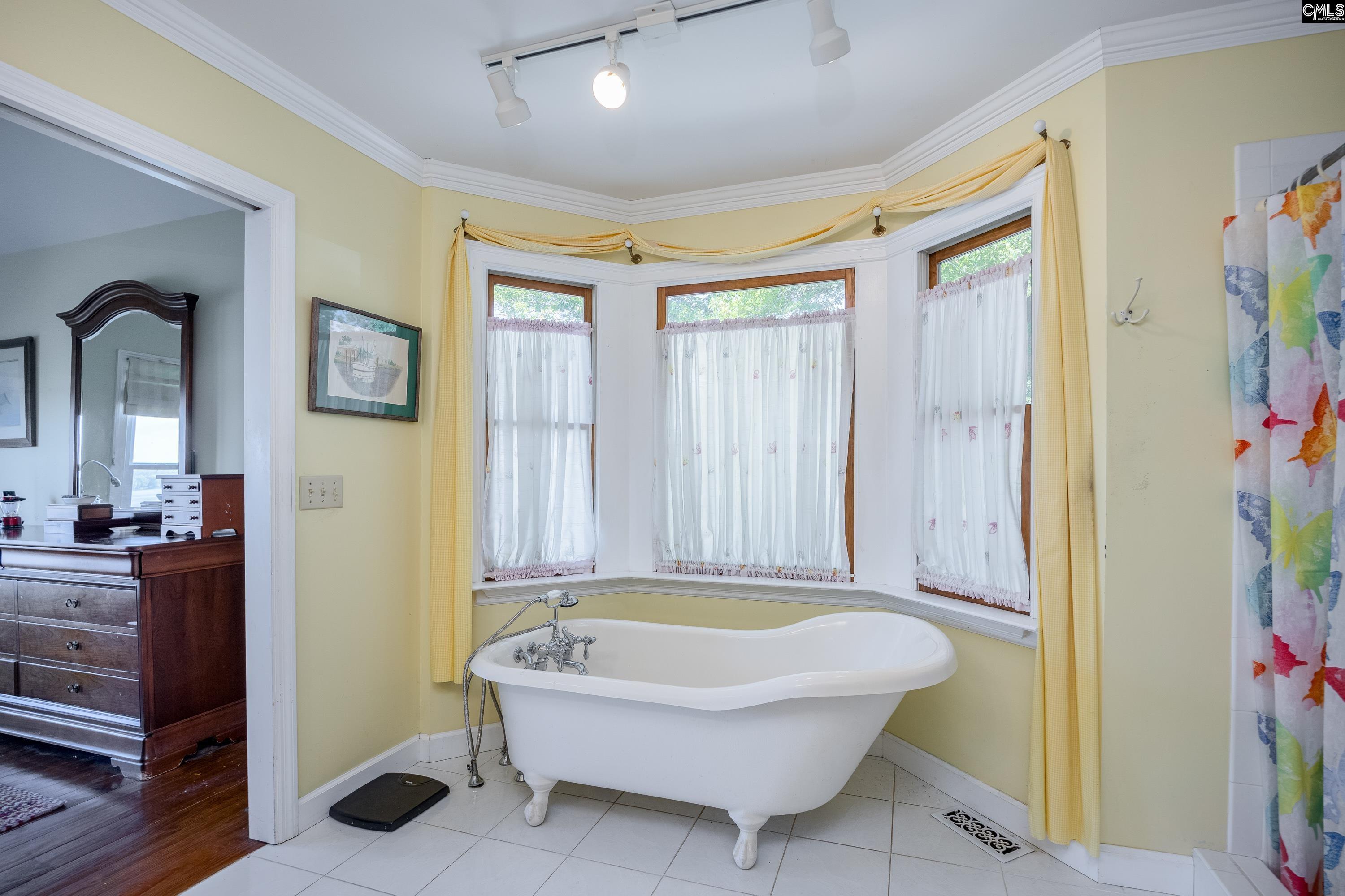 2577 Harbor View Road Camden, SC 29020 - Photo 28 of 42 a bathroom with a bathtub and shower