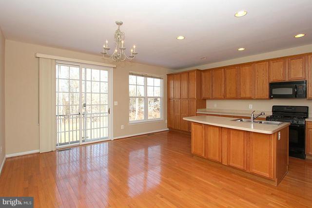 9077 Ribbon Falls Loop Bristow, VA 20136 - Photo 7 of 30 Dining Room- Kitchen