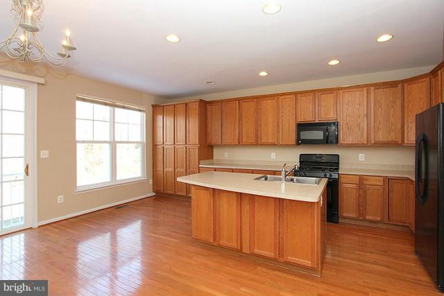 9077 Ribbon Falls Loop Bristow, VA 20136 - Photo 10 of 30 Dining Room- Kitchen