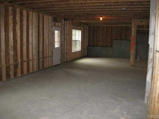 2105 Lower Lake Road Wake Forest, NC 27587 - Photo 11 of 12 HUGE unfinished walk-out basement offers so many possibilities! 1500 sf of finishable space! Basement