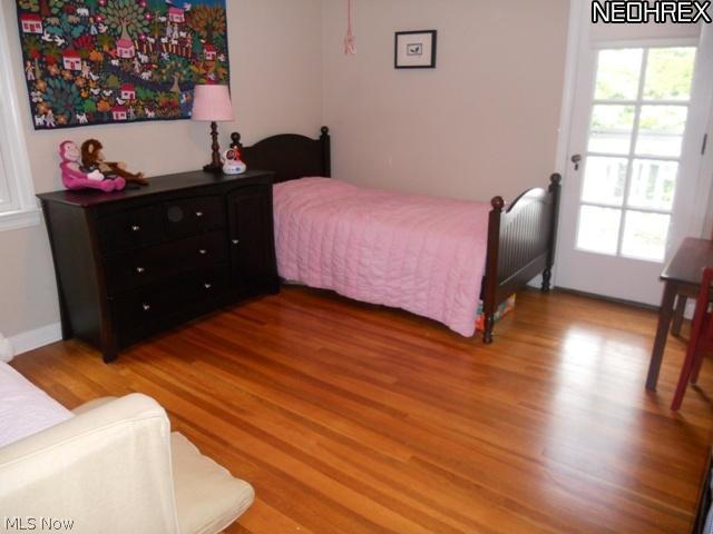 2441 Channing Road Cleveland, OH 44118 - Photo 10 of 16 Bedroom #2 with Gleaming Hardwood Floors and Door Leading to Roof Top Patio
