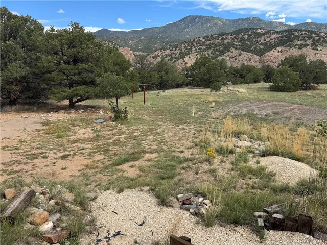 a view of swimming pool from a balcony